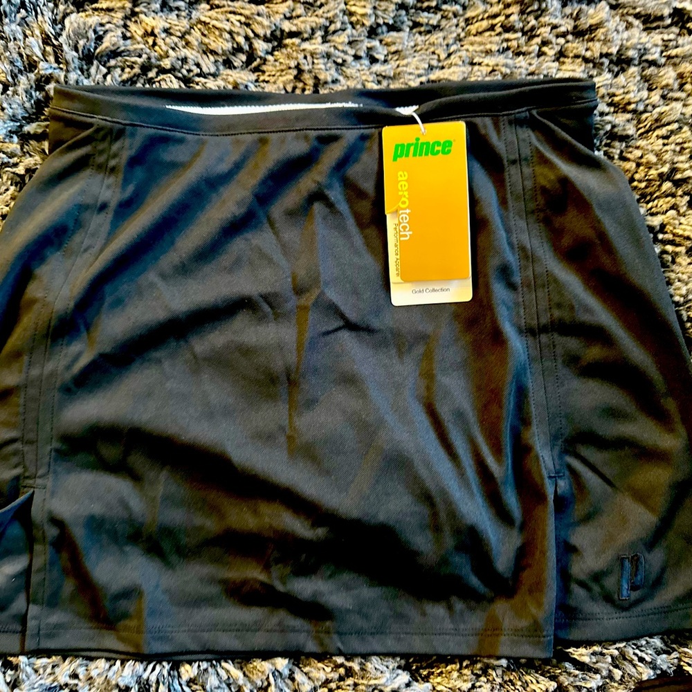 ORIGINAL TAGS, BRAND NEW Prince Tennis Skort.  Available in black or white.